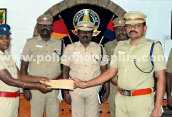 பெண் காவலருக்கு பாராட்டு மற்றும் வெகுமதி