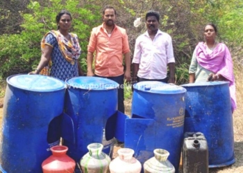 கிராமம் மலைக்குன்றின் அருகே 1,000 லிட்டர் கள்ளச்சாராய ஊறல்
