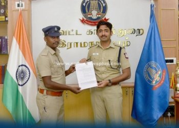 காவலரை பாராட்டிய எஸ்பி