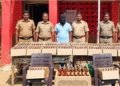 மதுபாட்டில்கள் வைத்திருந்த நபர் கைது