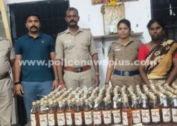 மதுபாட்டில்கள் பதுக்கிய பெண் கைது
